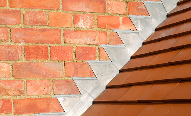 inspecting flashing on a roof