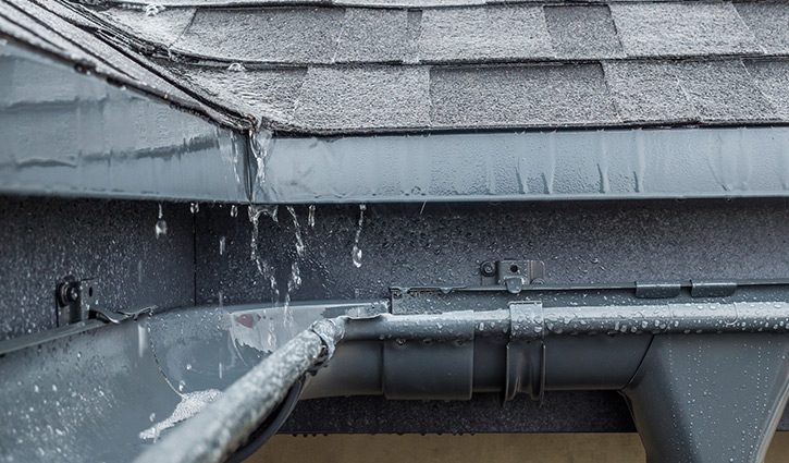 photo of a properly installed roof drainage system that helps prevent water damage and leaks